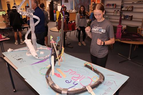  EMS eighth-graders' foam roller coasters filled the library with creativity